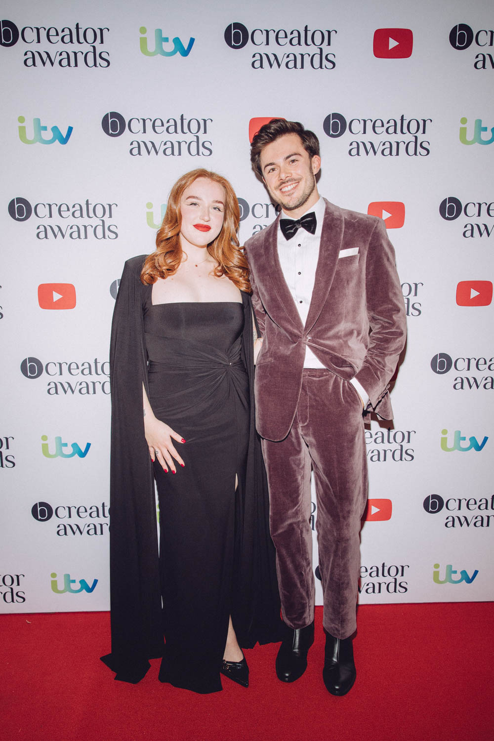 Eleanor wearing a long black dress with a cape effect, styled by Carlotta Constant.
Jack Edwards wore a velvet suit paired with a black bow tie and boots.